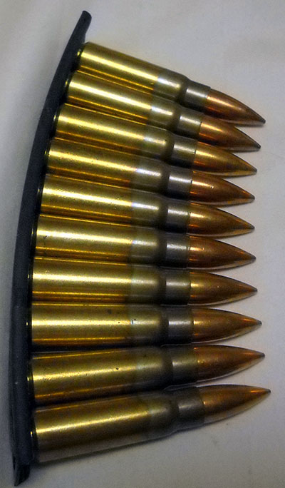 10 rounds of 7.62x39mm ammunition on an SKS stripper clip